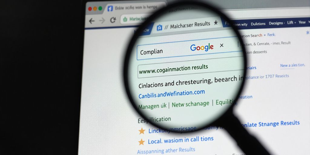 Magnifying glass over a web page.